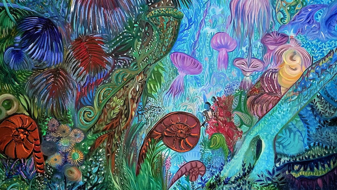 The rainforest has evolved, and in doing so, has converged with the ocean reef. Bioluminescent species cast a surreal underwater glow. Fiddleheads curl into themselves like nautiloids. Fleshy palm fronds fan outward from bulbous stems like sea anemones. Fungal spirits bob gently upon the breeze, their shaggy mycelia dangling like tentacles from bowl-shaped caps. The arc of a lichen-covered branch scaffolds the ecosystem like coral.