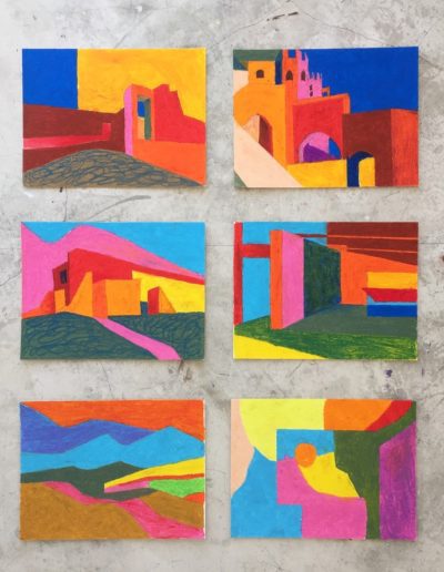 A two by three array of oil pastel drawings on paper, affixed to a concrete wall. The mottled grey surface amplifies the bold, flat colours of the abstract city- and landscapes.